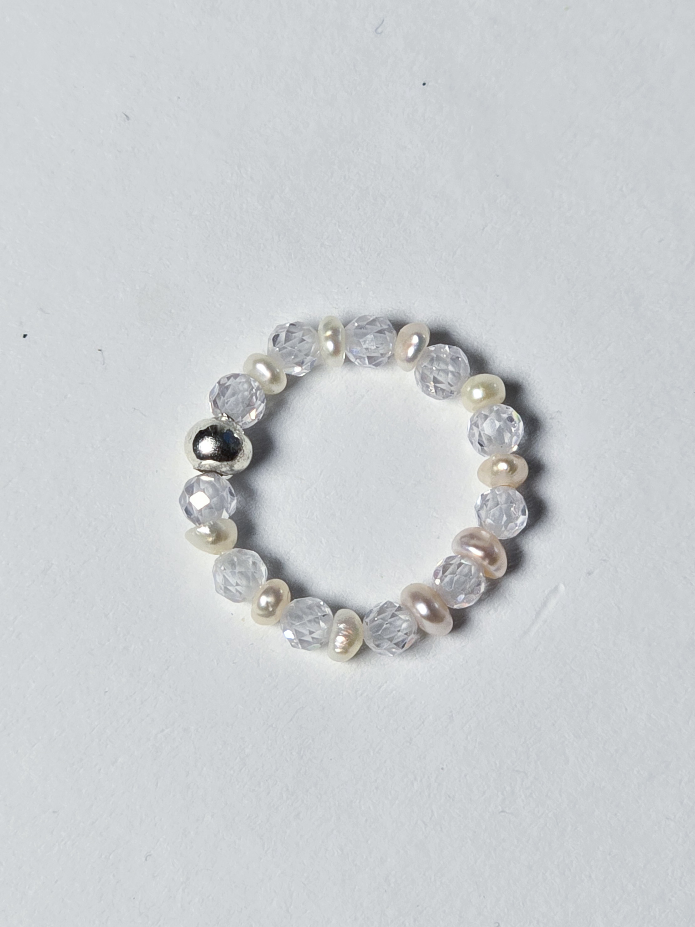 Кабулучка на еластичній основі №26 Прозорий циркон, мікро перли