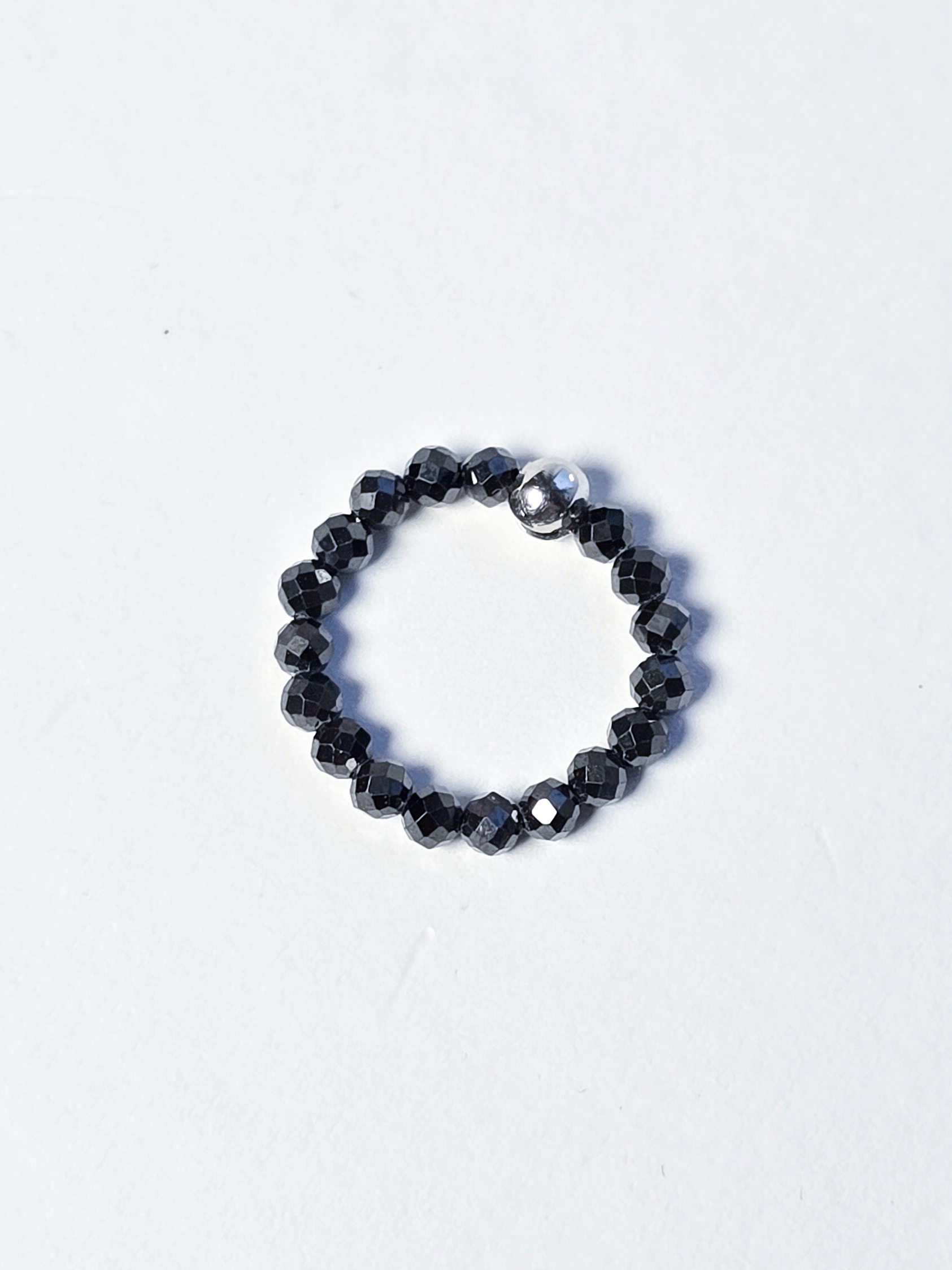 Кабулучка на еластичній основі №8 Чорний циркон 